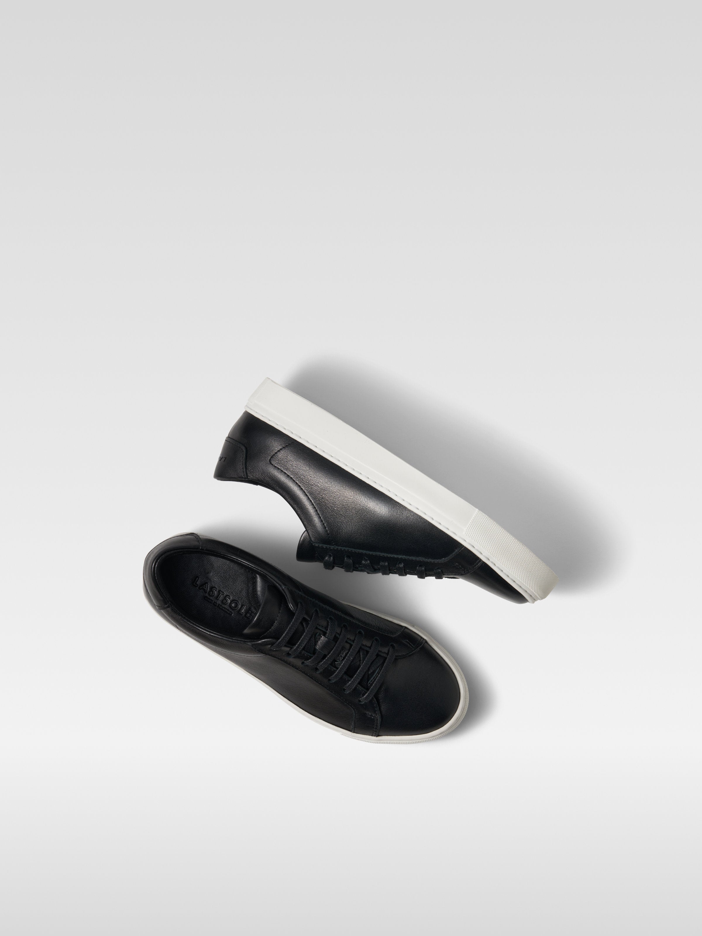 Black leather sneakers for women