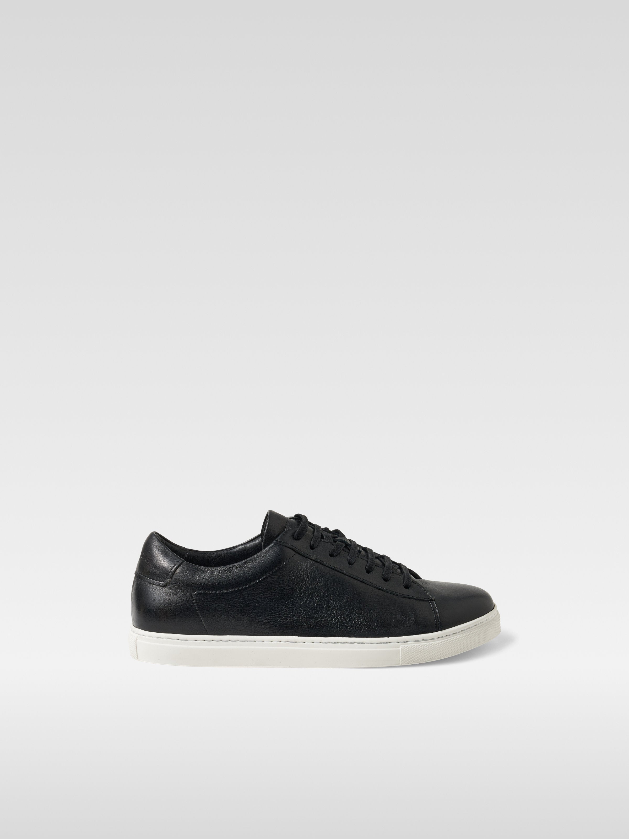 Black leather sneakers in white sole for women