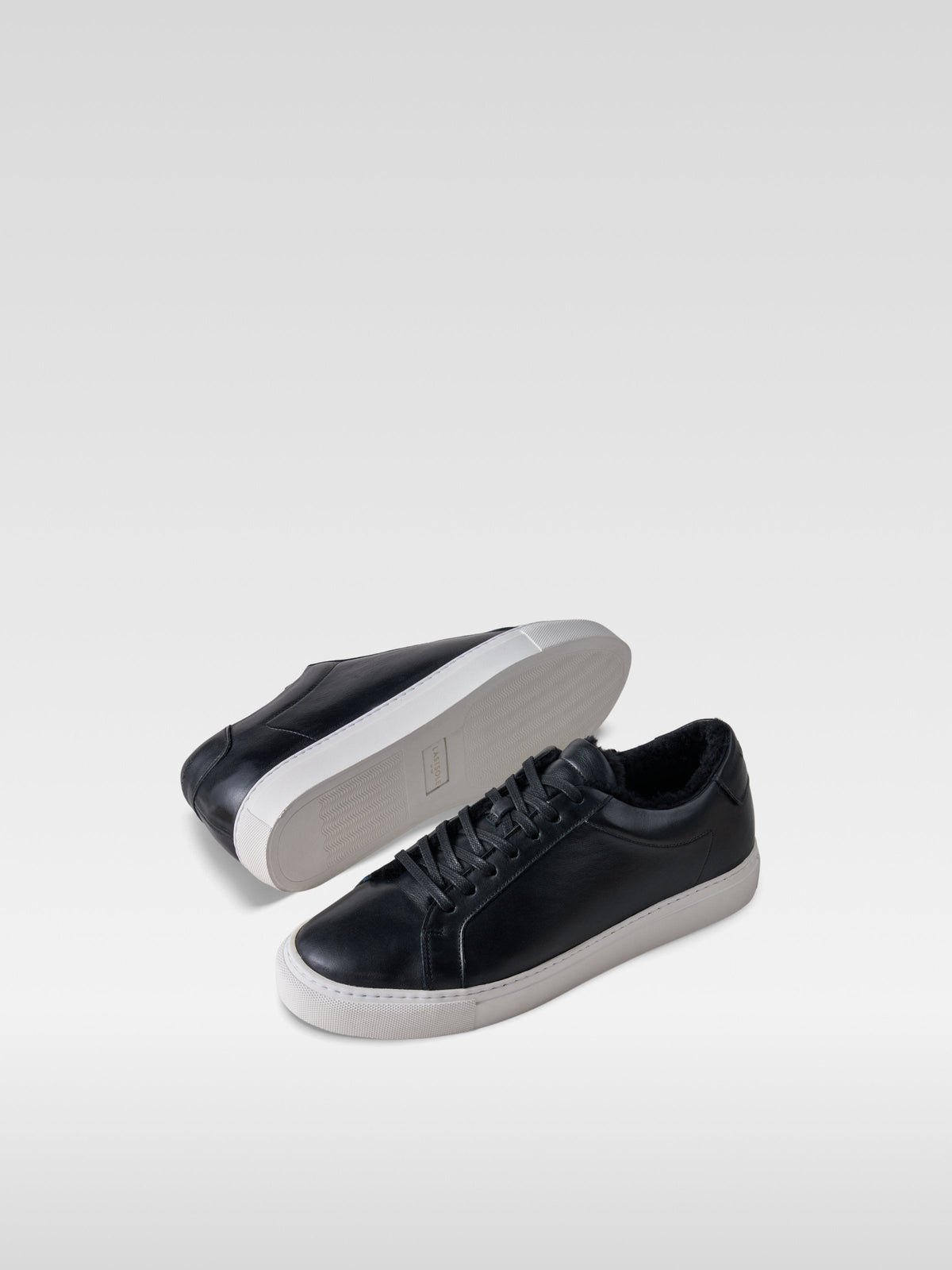 Metro black leather shearling-lined sneakers for women, front view
