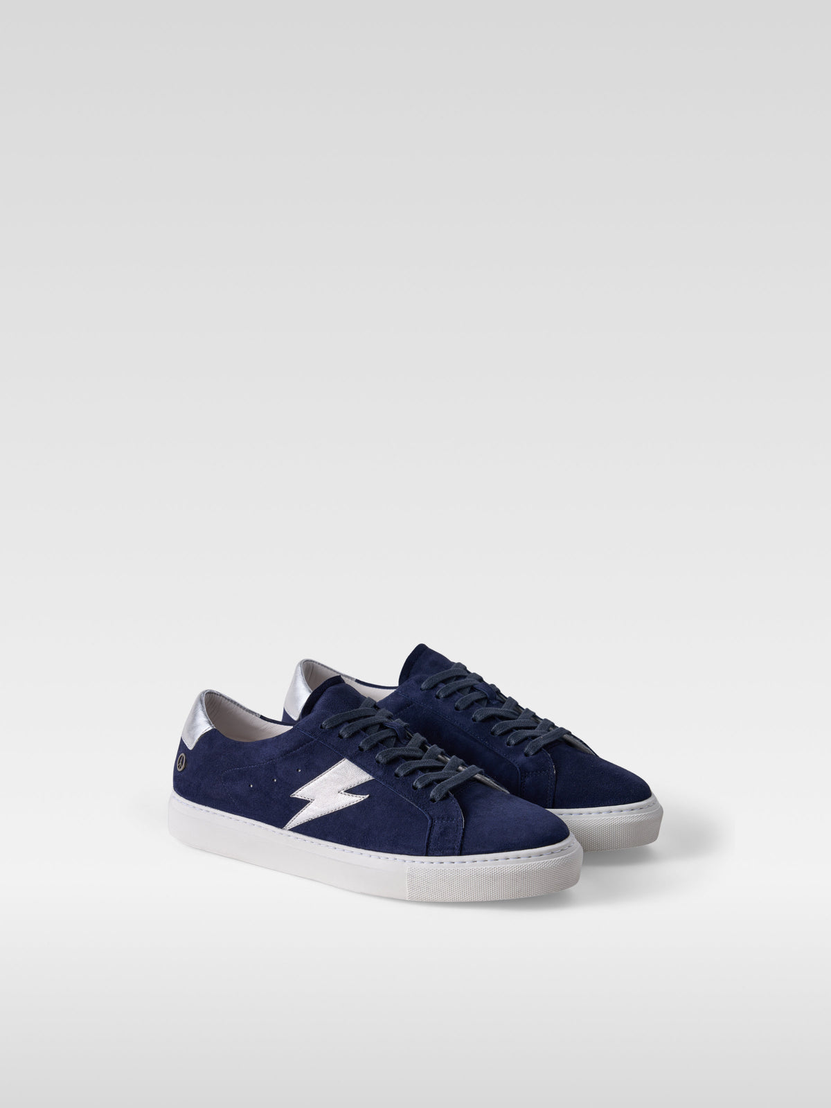 Pulse navy suede sneakers with silver lightning bolt for men, three-quarter view