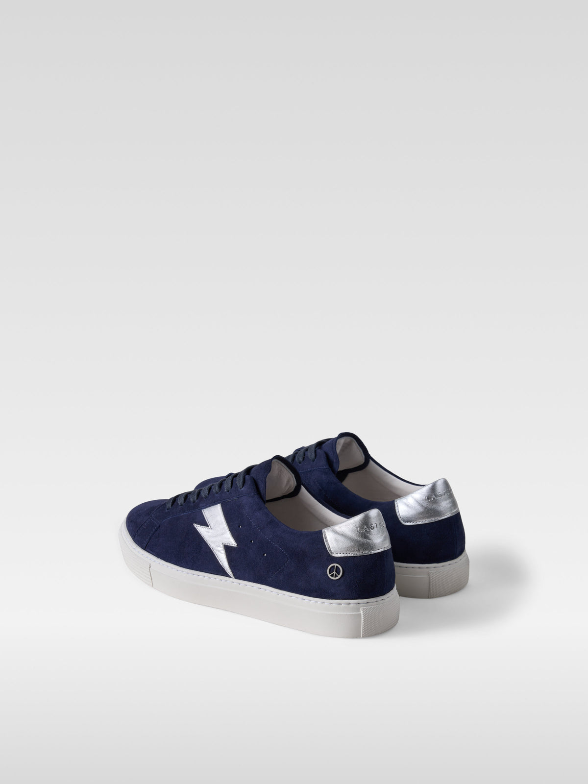 Pulse navy suede sneakers with silver lightning bolt for men, heel view