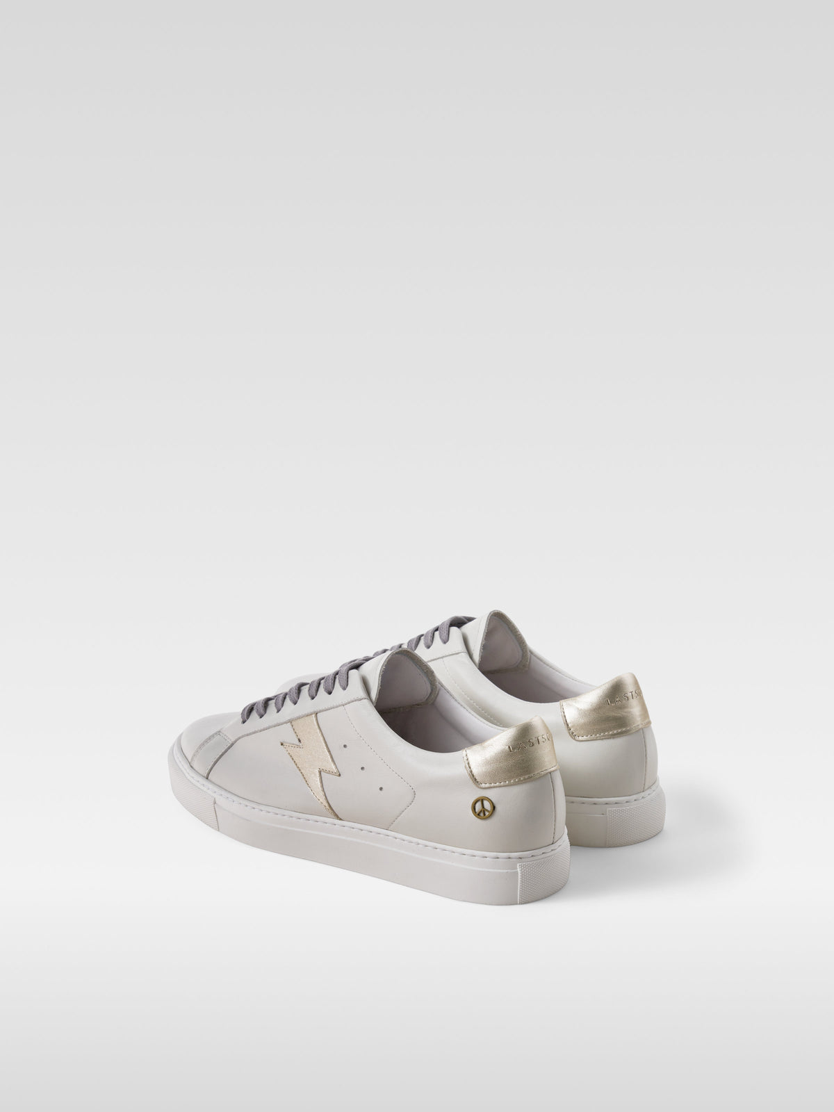 Pulse off white nappa sneakers with gold lightning bolt for men, heel view
