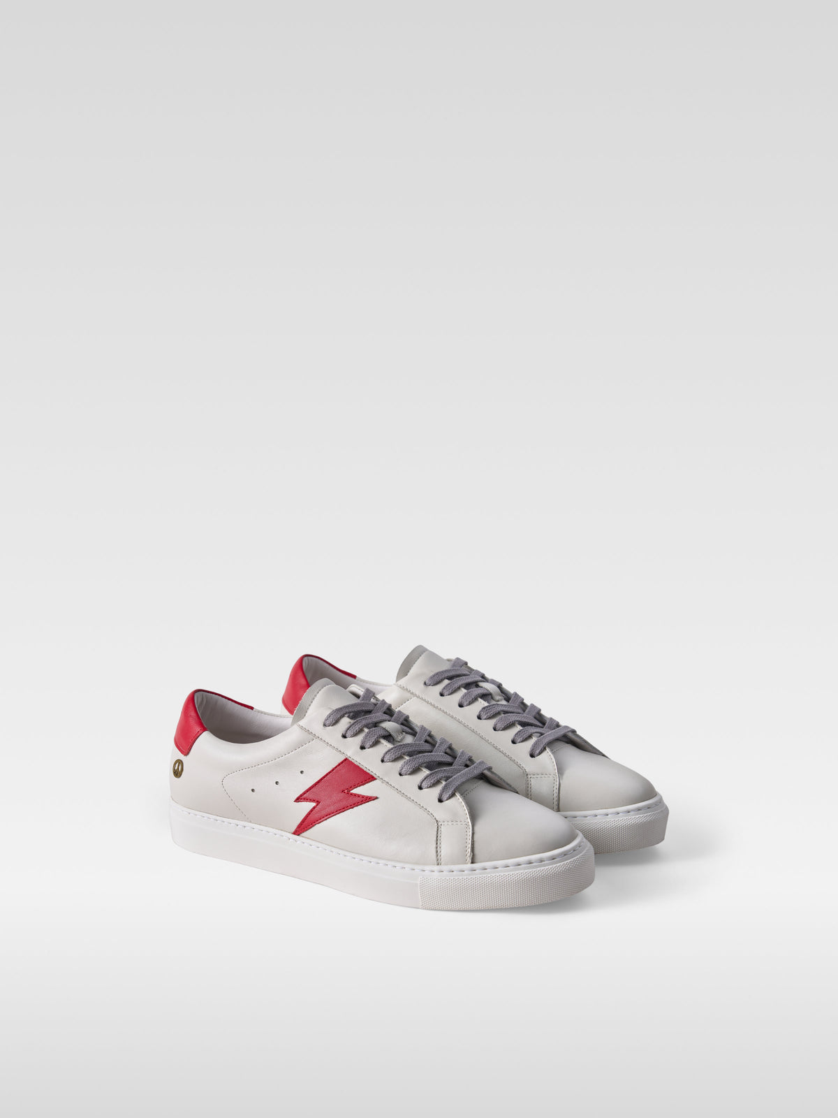 Pulse off white nappa sneakers with red lightning bolt for men, three-quarter view