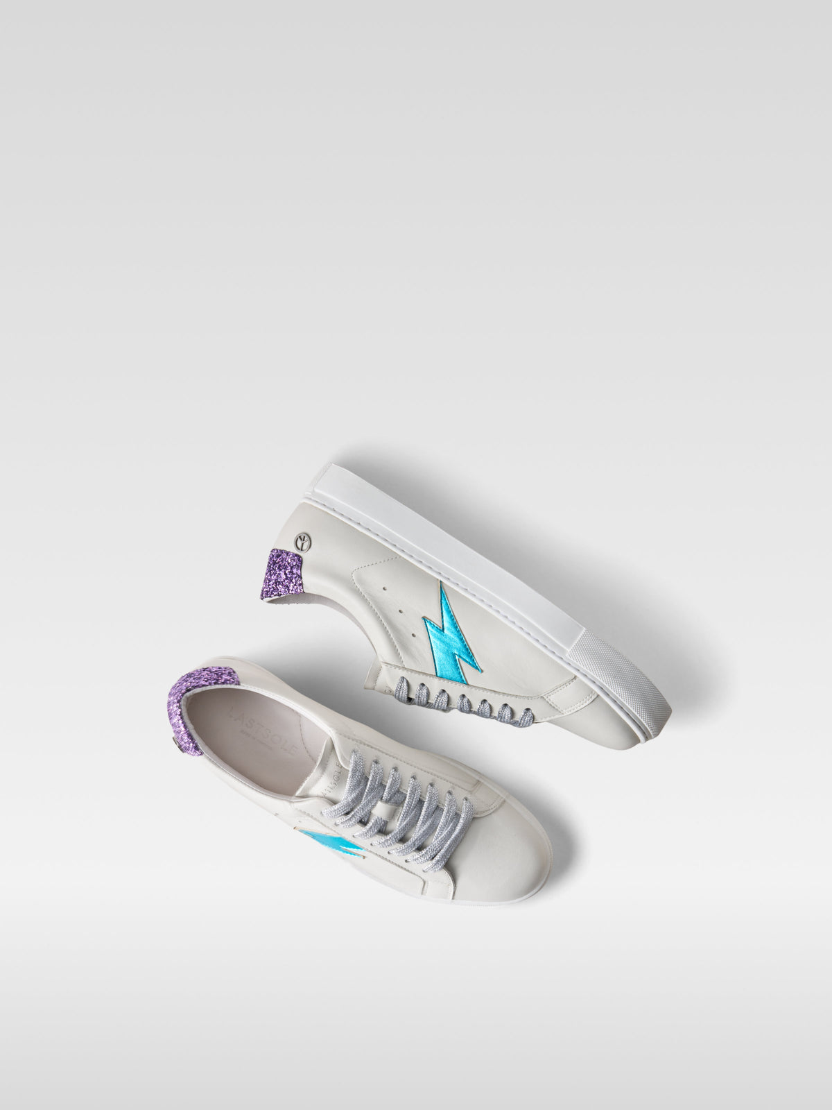 Pulse off white nappa sneakers with turquoise lightning bolt for women