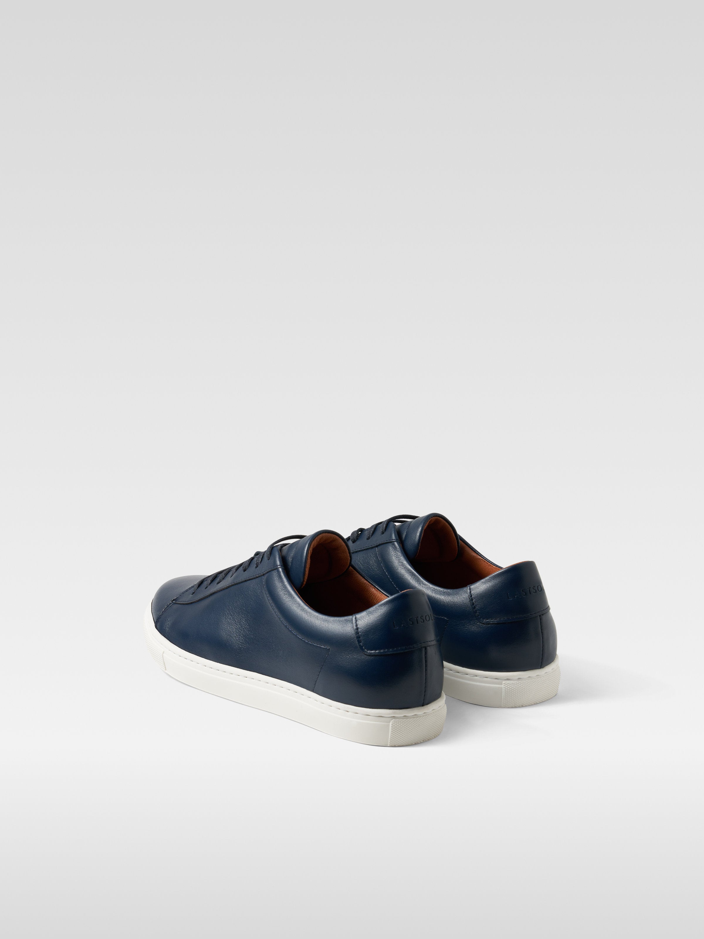 Navy leather sneakers in white sole for men