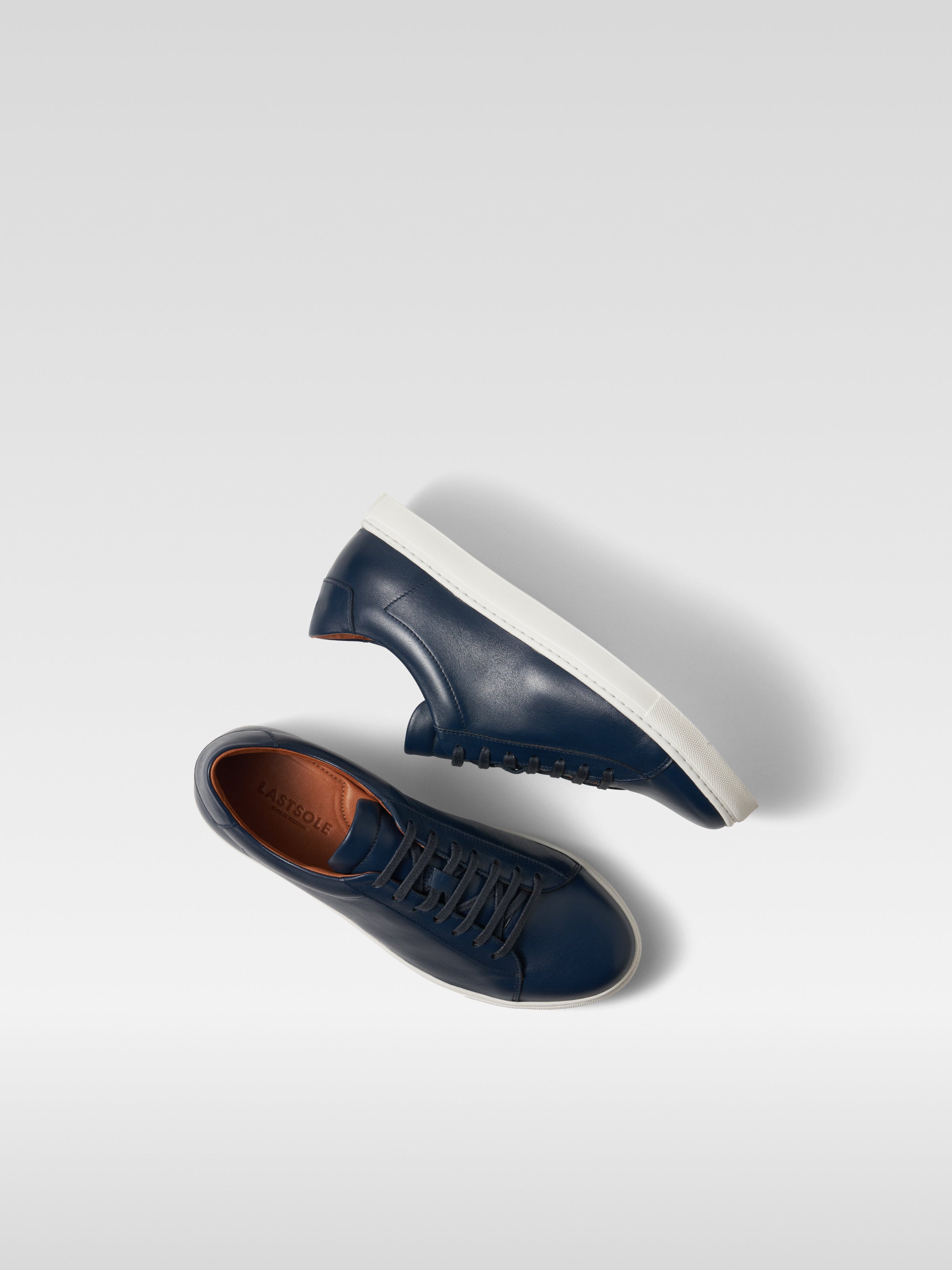 Navy leather sneakers in white sole for women