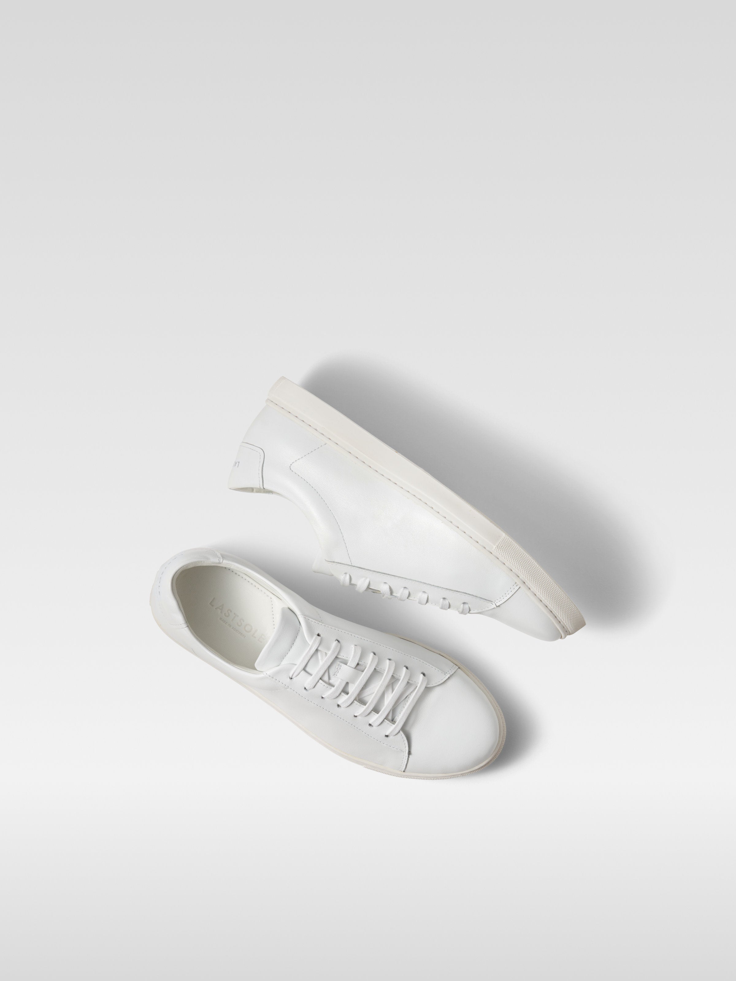 White leather sneakers in white sole for men