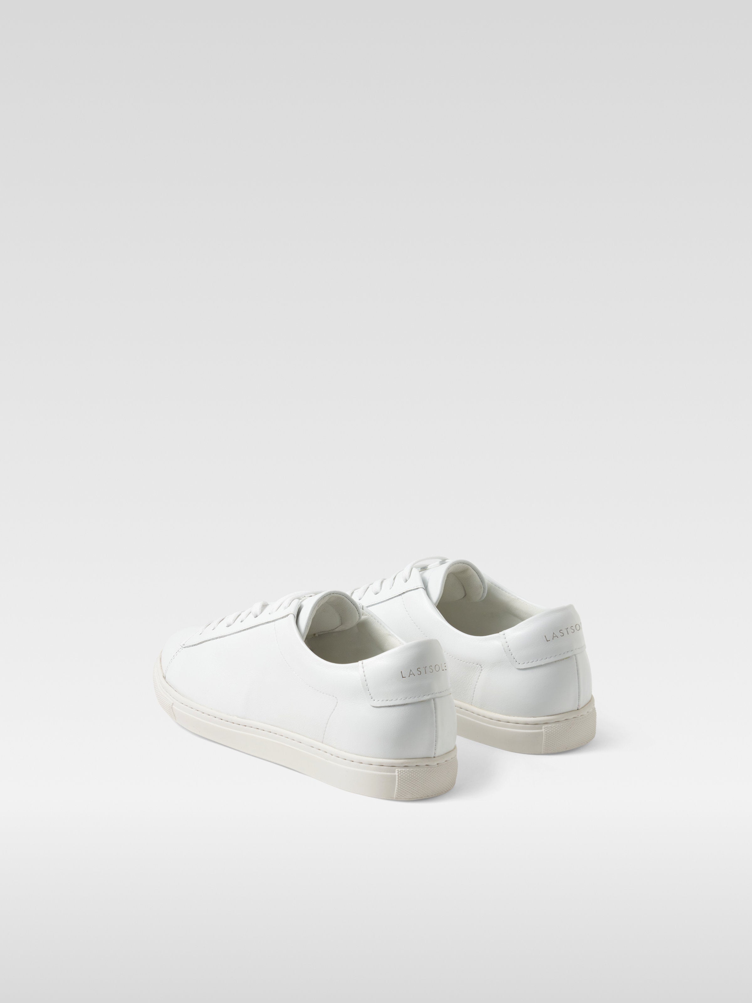 White leather sneakers in white sole for women