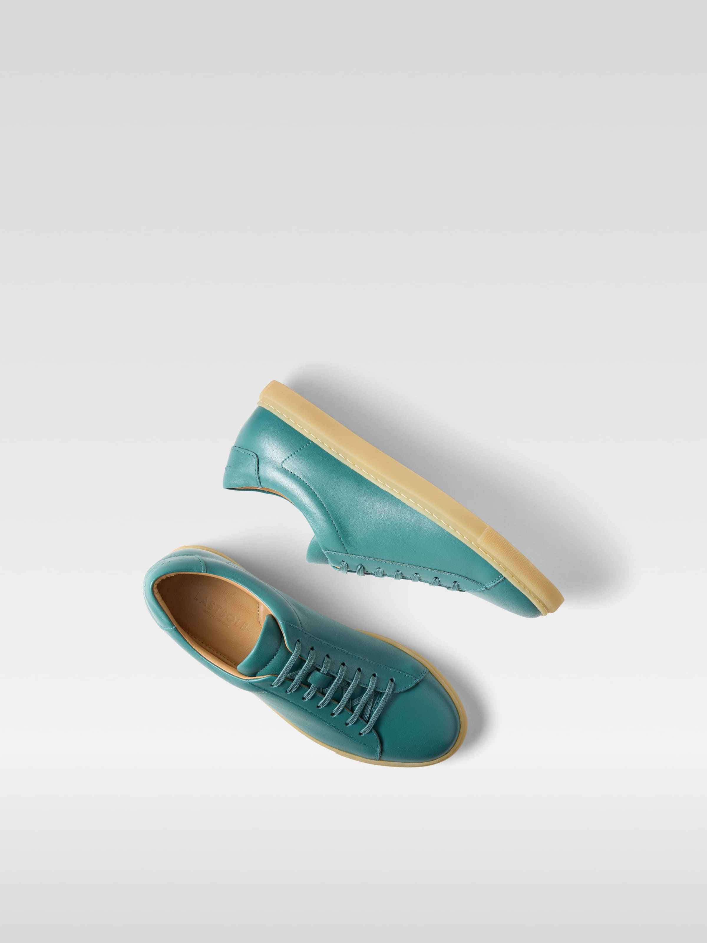 D.Green leather sneakers in gum sole for men